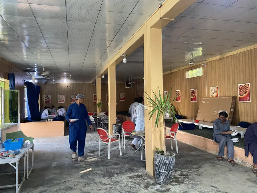 The indoor dining hall at Safdar Hotel in Takht Bhai